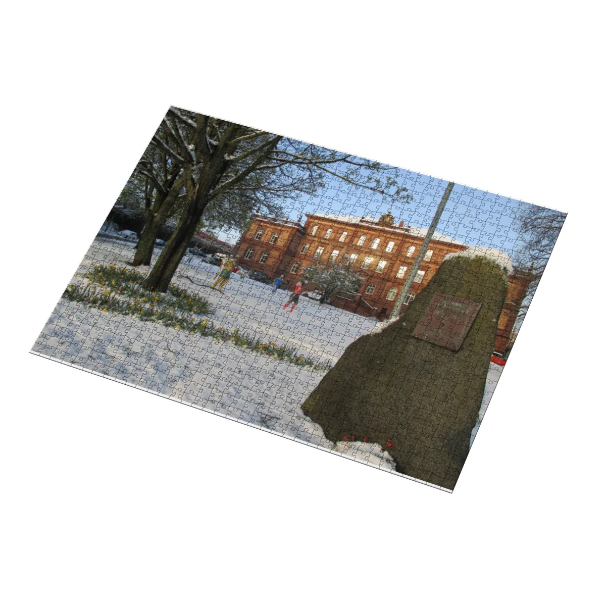 Puzzle Fußball-Skulpturen im Schnee bei Sonnenschein